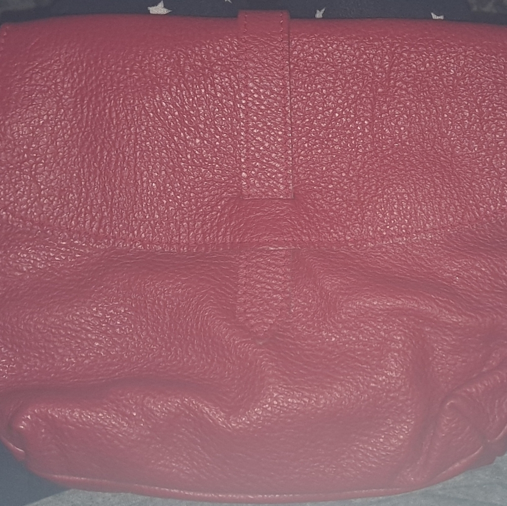 New buttery leather red crossbody. Snap Closure. Clean Inside. 1 Pocket In/out. - Picture 8 of 8